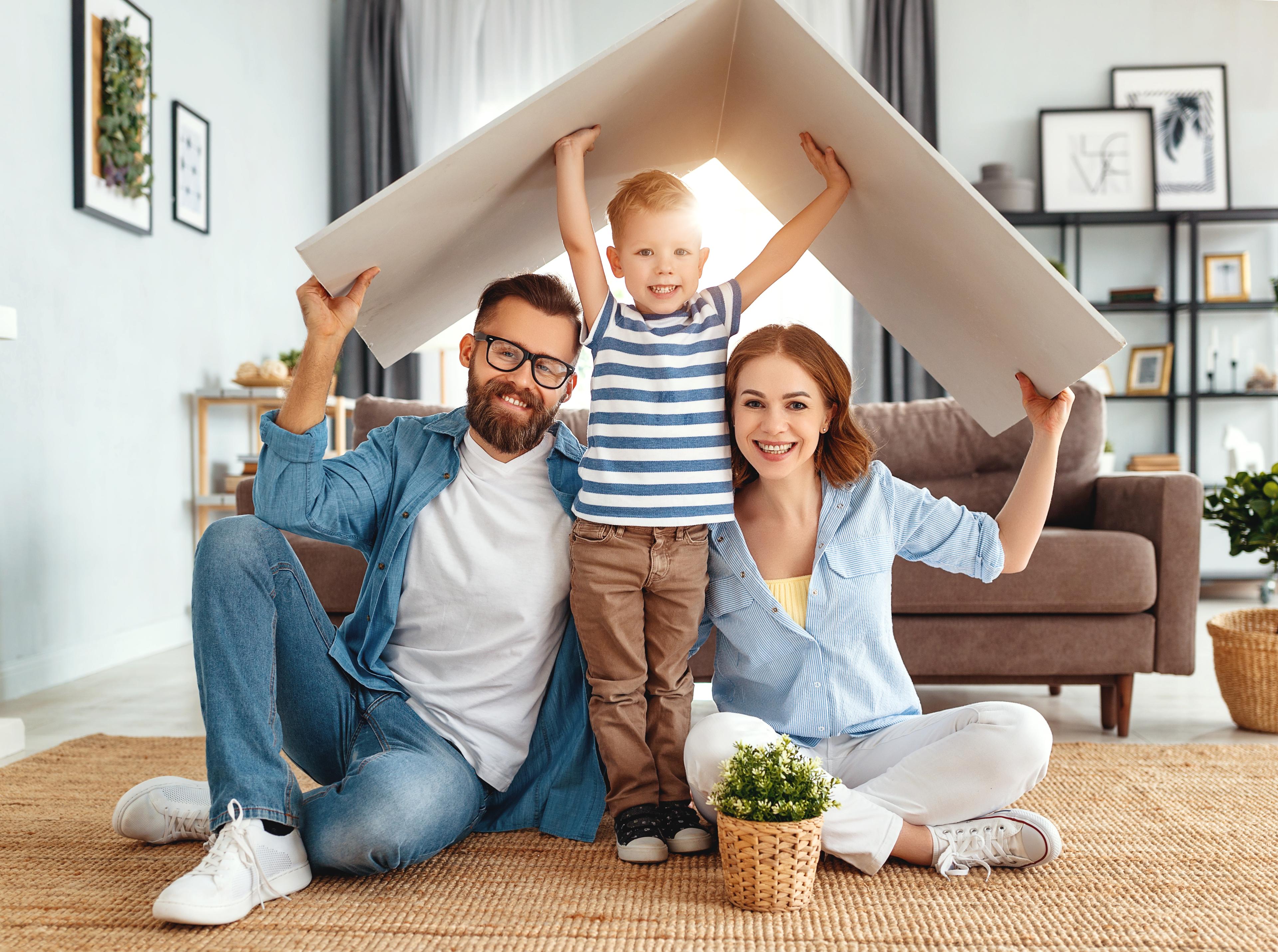 Concept,Housing,A,Young,Family.,Mother,Father,And,Child,In