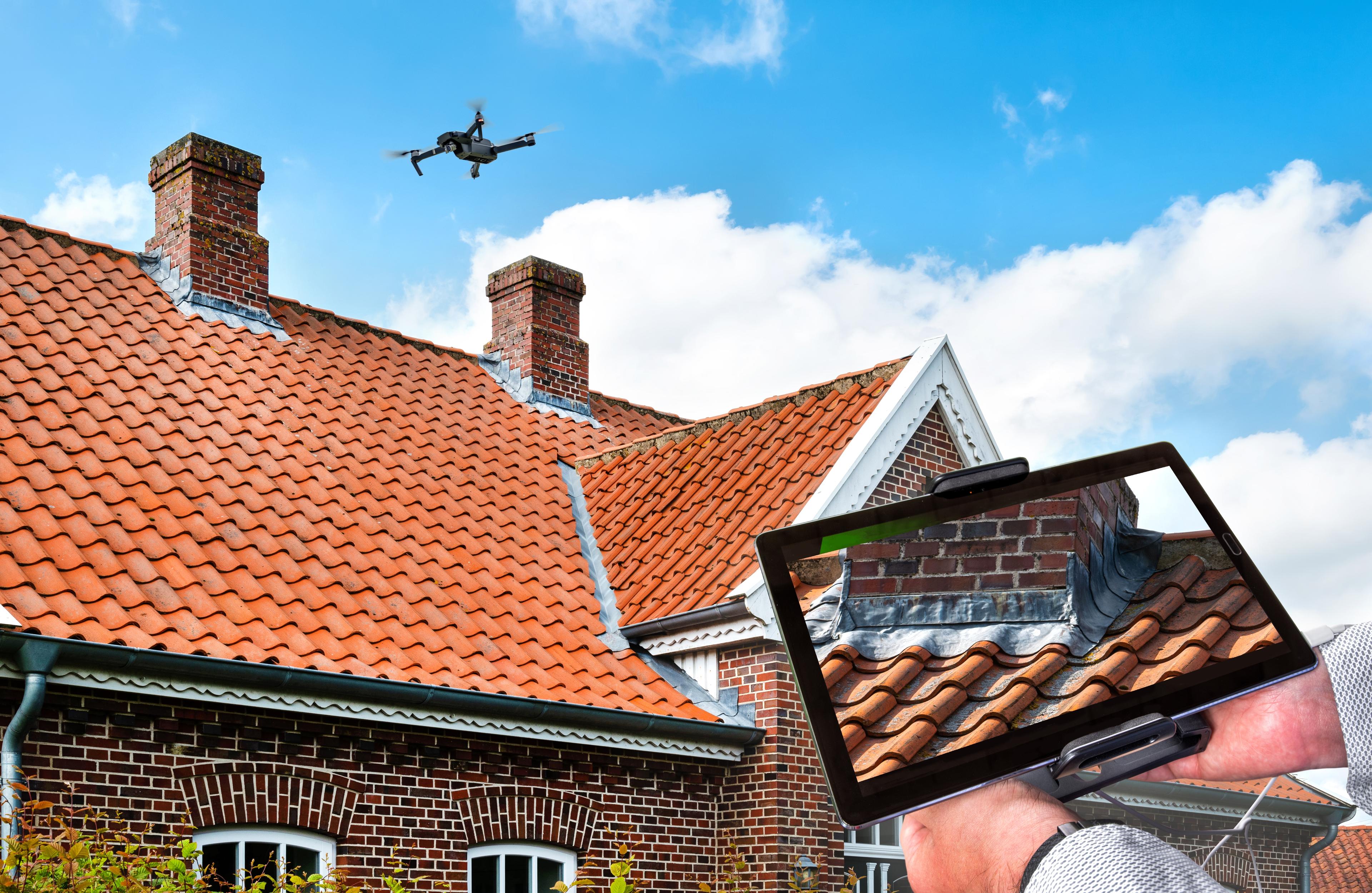 Drone,In,The,Air,Inspecting,The,Roof,Over,The,House.